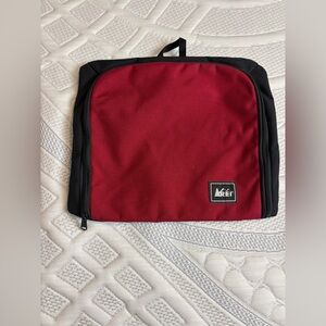 REI canvas toiletry bag in red